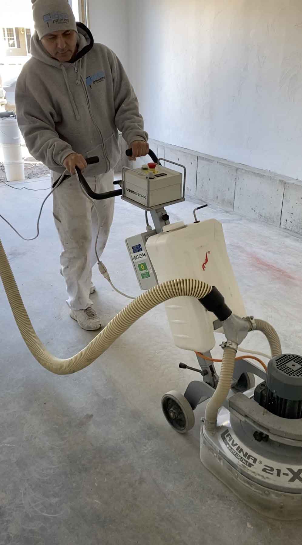 sanding concrete garage floor